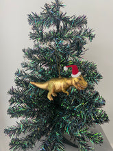 Indlæs billede til gallerivisning Glass Christmas dinosaur with hat Christmas bauble tree hanging decoration/christmas/seasonal/ glass hanging item - Marissa's Garden & Gift