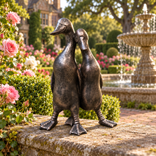Afbeelding in Gallery-weergave laden, New Bronze ducks pair polyresin ornament in a scenic garden