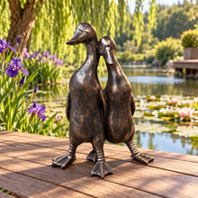 Afbeelding in Gallery-weergave laden, New Bronze ducks pair polyresin ornament in a scenic garden