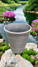 Load image into Gallery viewer, Sunflower coloured grey flower pot available in two sizes made out of recycled plastic - Marissa's Garden & Gift