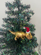 Indlæs billede til gallerivisning Glass Christmas dinosaur with hat Christmas bauble tree hanging decoration/christmas/seasonal/ glass hanging item - Marissa's Garden & Gift