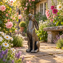 Laden Sie das Bild in den Galerie-Viewer, Moon gazing hare garden ornament in aged gold finish, 38 cm tall, in a landscaped garden