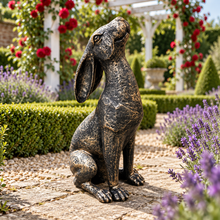Load image into Gallery viewer, New Bronze Moon Gazing Hare, 38 cm polyresin garden ornament in a landscaped garden