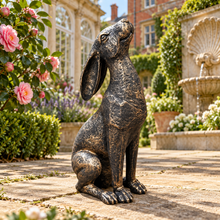 Load image into Gallery viewer, New Bronze Moon Gazing Hare, 38 cm polyresin garden ornament in a landscaped garden
