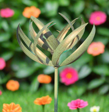 Laden Sie das Bild in den Galerie-Viewer, Burghley garden wind sculpture spinner verdigris - Marissa's Garden & Gift