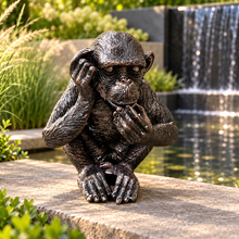 Load image into Gallery viewer, Monkey Business ornament in landscaped garden setting 4