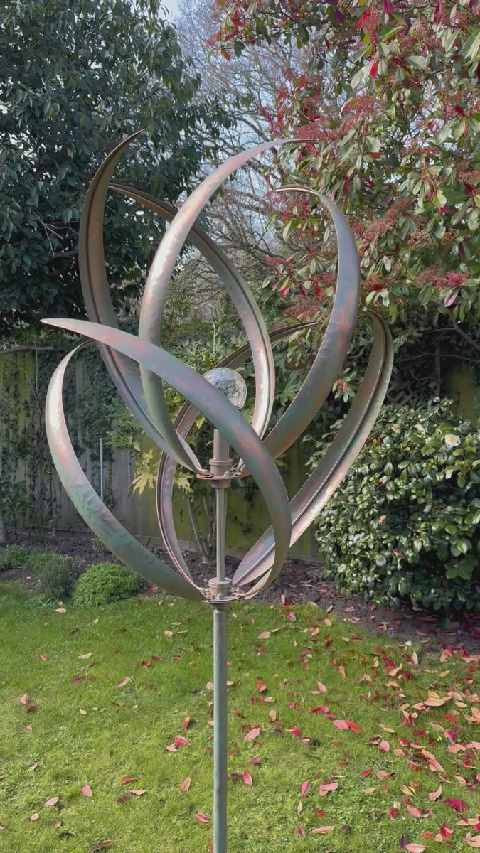 knightsbridge Verdigris windsculpture windspinner with solar bulb