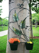 Afbeelding in Gallery-weergave laden, Green leaf design fern metal flowerpot wall planter with two pots measuring Height 66cm x Width 41cm pots width 16cm for outdoors. - Marissa's Garden & Gift