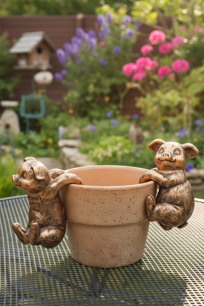 Polyresin pair of bronze coloured pigs pot hangers