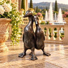 Afbeelding in Gallery-weergave laden, New Bronze ducks pair polyresin ornament in a scenic garden
