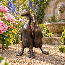 Afbeelding in Gallery-weergave laden, New Bronze ducks pair polyresin ornament in a scenic garden
