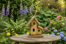 Load image into Gallery viewer, Handmade wooden birdhouse hut with three entrances measuring 16 x 10 x 21cm
