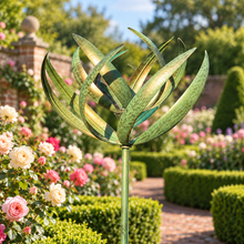 Laden Sie das Bild in den Galerie-Viewer, WS350 Burghley verdigris and gold wind sculpture in an English rose garden

