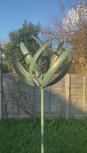 Load and play video in Gallery viewer, Burghley garden wind sculpture spinner verdigris
