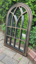 Load and play video in Gallery viewer, Henley Bronze with black touch arched Outdoor/Indoor mirror measuring 72 x 52 x 3cm
