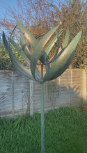 Indlæs og afspil video i gallerivisning Burghley garden wind sculpture spinner verdigris
