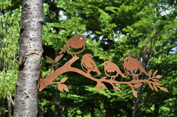 Handmade family of rusty metal birds perched on a branch for garden measuring  33 x 10 x 60cm.