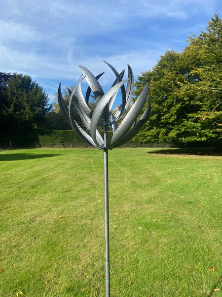 Burghley garden wind sculpture spinner silver with black brush
