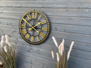 Oversized Gold and black Skeleton outdoor/indoor clock