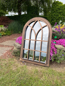 Henley Bronze with black touch arched Outdoor/Indoor mirror measuring 72 x 52 x 3cm