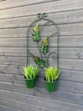 Load image into Gallery viewer, Green leaf design fern metal flowerpot wall planter with two pots measuring Height 66cm x Width 41cm pots width 16cm for outdoors.
