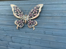 Indlæs billede til gallerivisning Handmade Metal Butterfly gold with blue touch Garden Wall Art with purple Decorative Stones measuring 49 x 4 x 70CM
