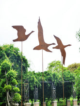 Laden Sie das Bild in den Galerie-Viewer, Three large rusty Flying Geese Garden Art on poles measuring 25 x 16.5 cm for garden/outdoor.
