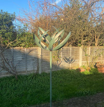 Laden Sie das Bild in den Galerie-Viewer, Burghley garden wind sculpture spinner verdigris

