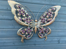 Load image into Gallery viewer, Handmade Metal Butterfly gold with blue touch Garden Wall Art with purple Decorative Stones measuring 49 x 4 x 70CM
